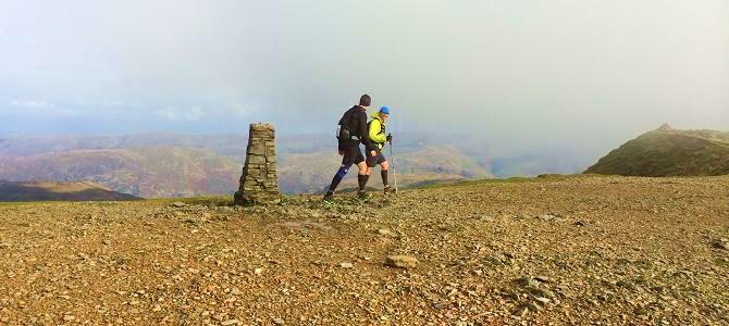 Running over the summit of Helvellyn on the Bob Graham Round route